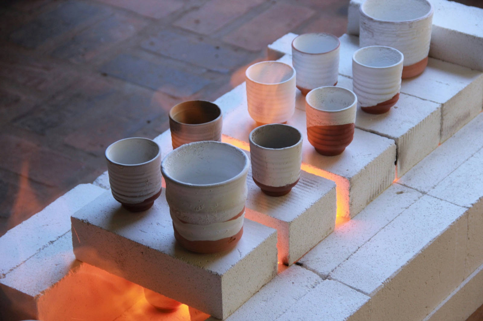 Assorted ceramic pottery vessels for Epo-Weld™ high emissive ceramic coating refractory fiber module applications