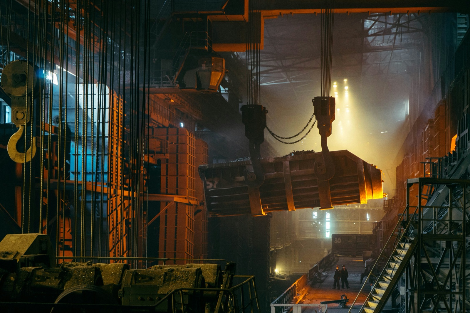 Two industrial workers near factory wall for Epo-Weld™ HSS high strength structural epoxy engine block and casting
