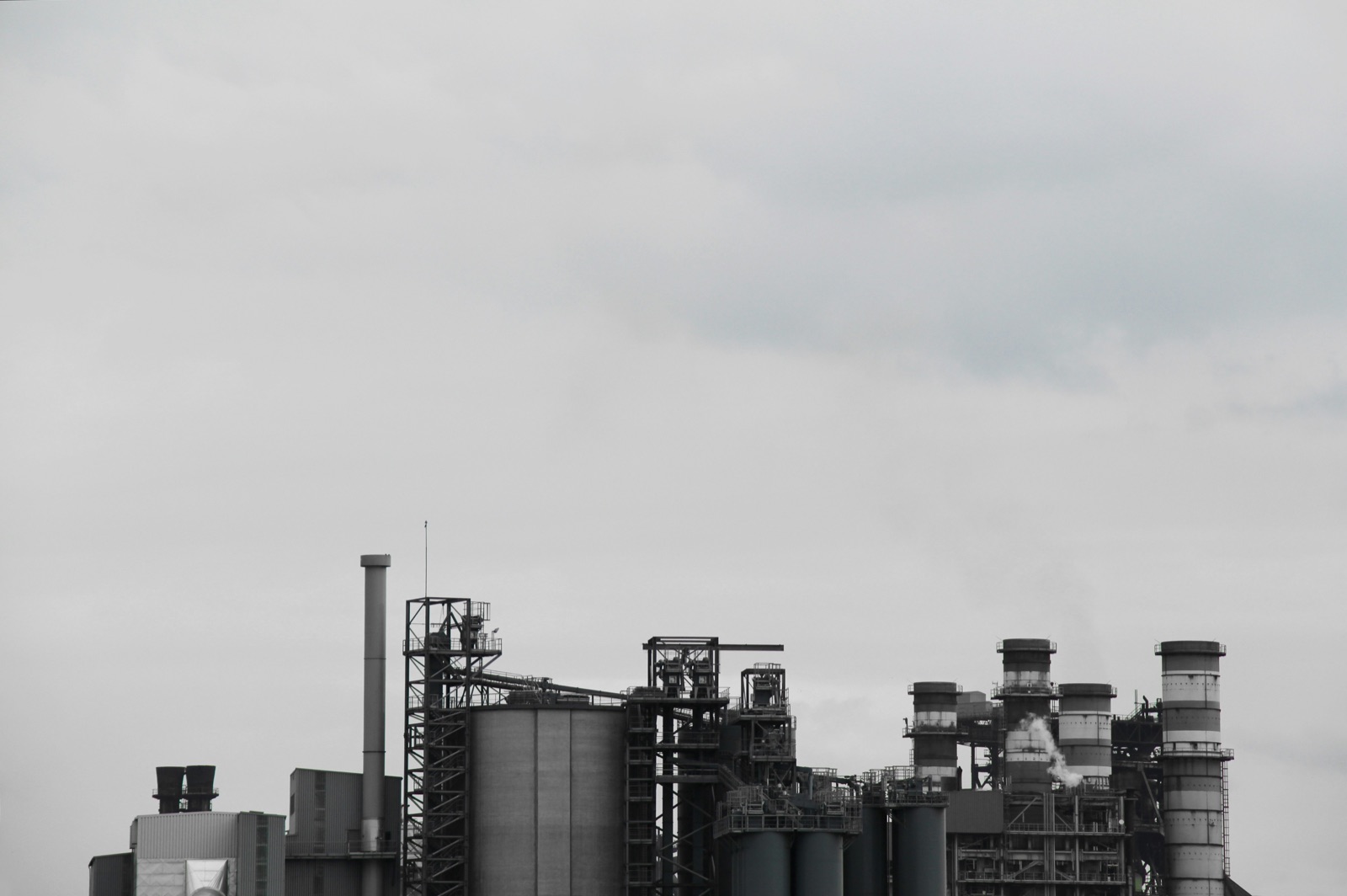 Gray concrete factory exterior for Epo-Weld™ HSS high strength structural epoxy tank lining and impeller repair