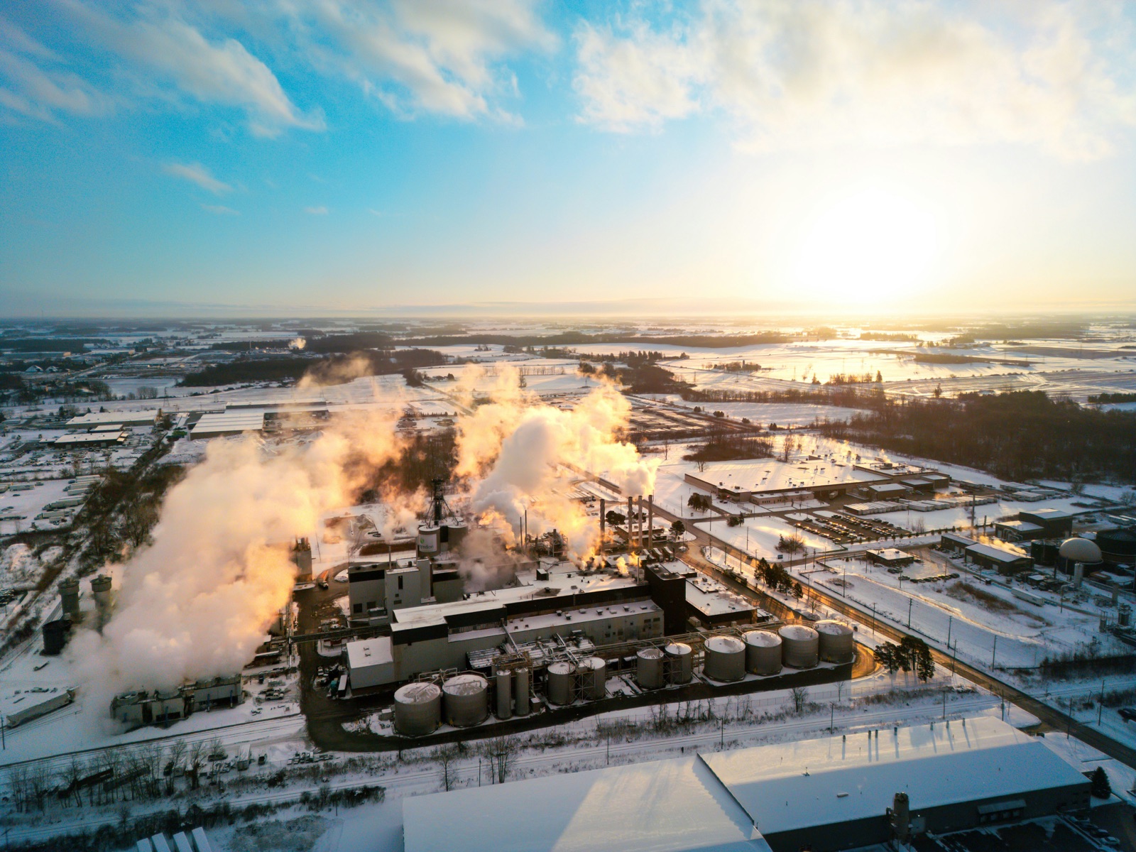 Industrial complex emitting steam on snowy day for Epo-Weld™ TC thermally conductive epoxy cryogenic and aerospace