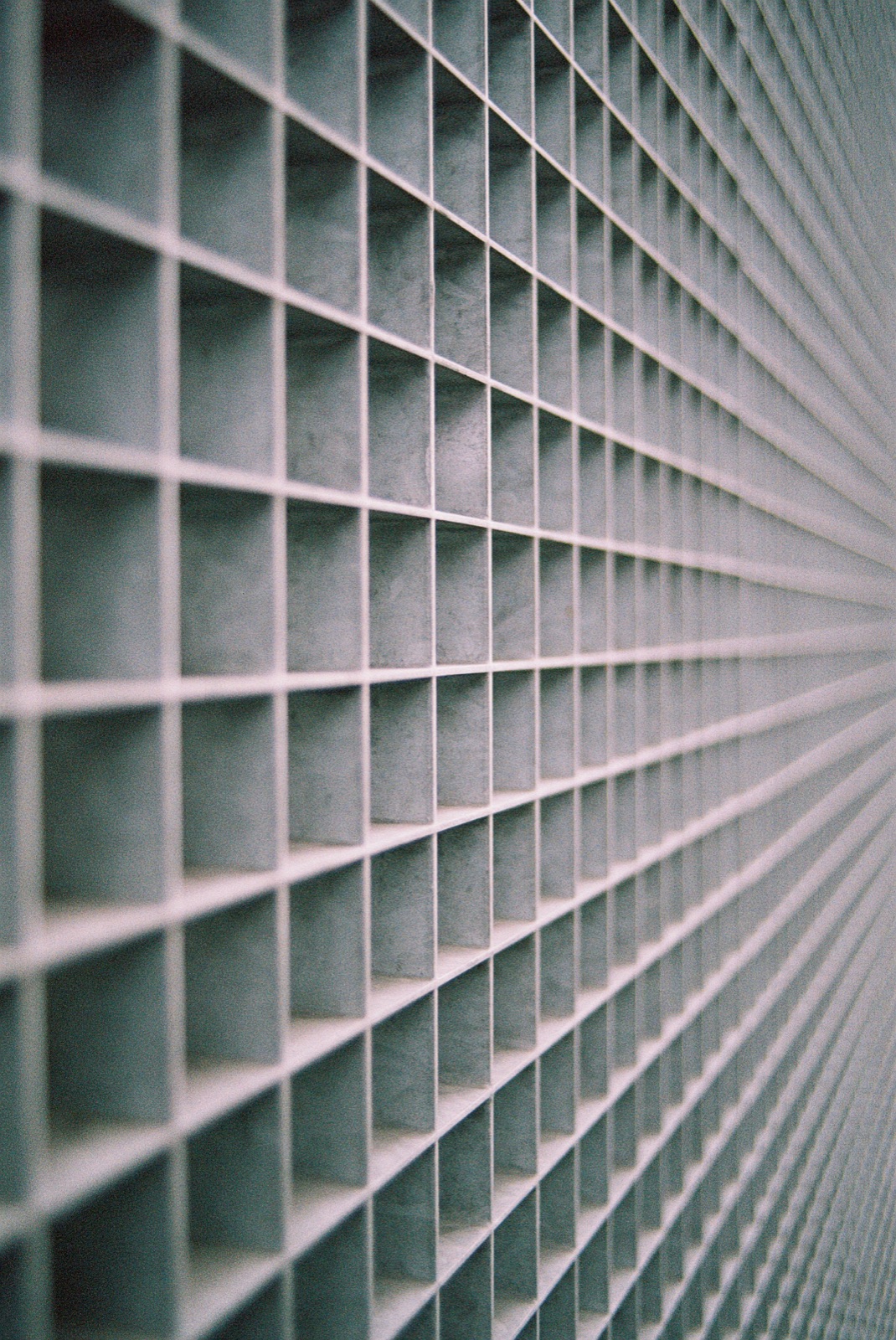 Gray metal frame in close-up photography for Epo-Weld™ TEC conductive epoxy EMI and RFI shielding application
