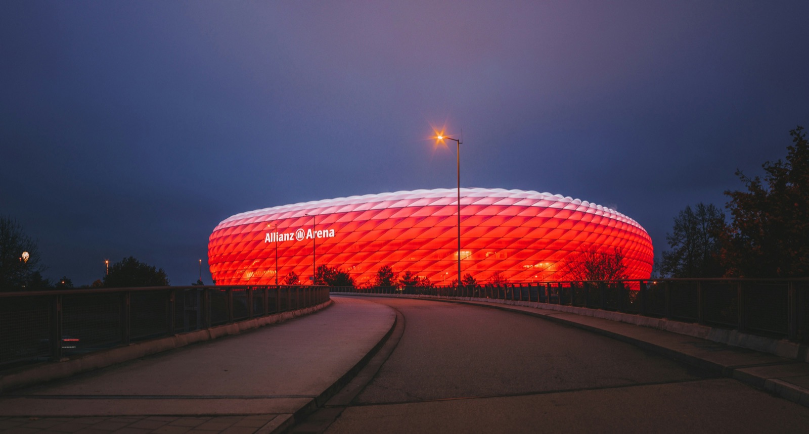 Panoramic view of red stadium with bright floodlights for Epo-Weld™ UHTC ultra high temperature coating stadium