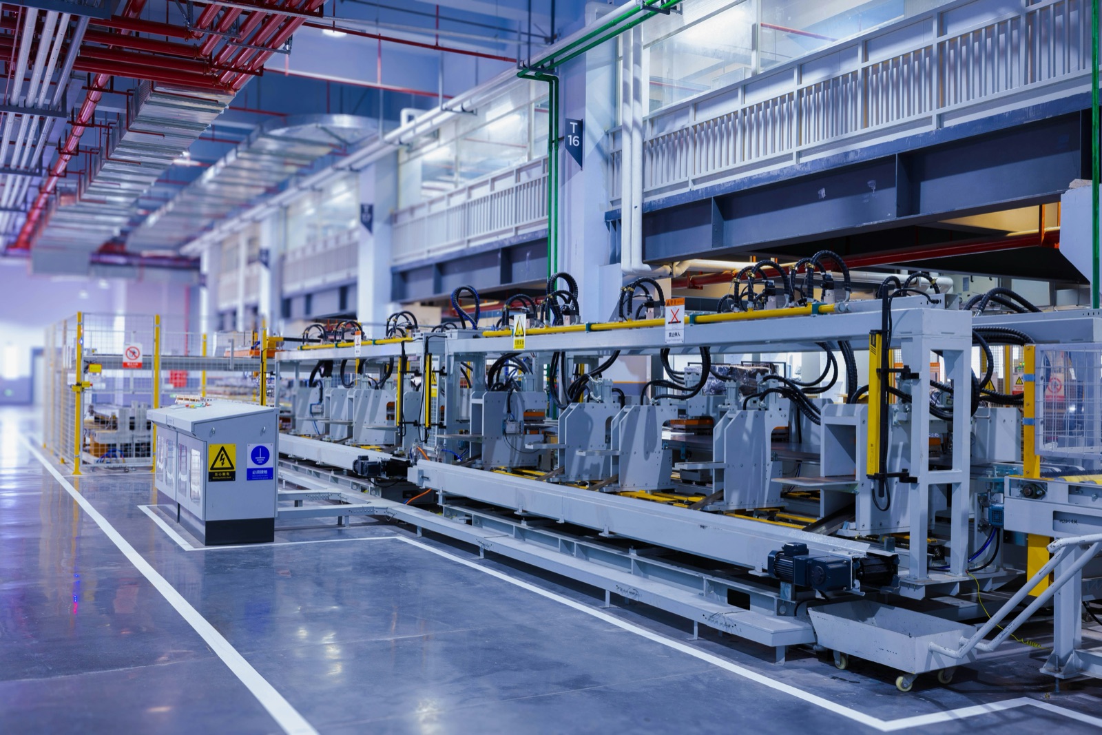 Automated industrial manufacturing line in a modern factory for heavy industrial assembly applications