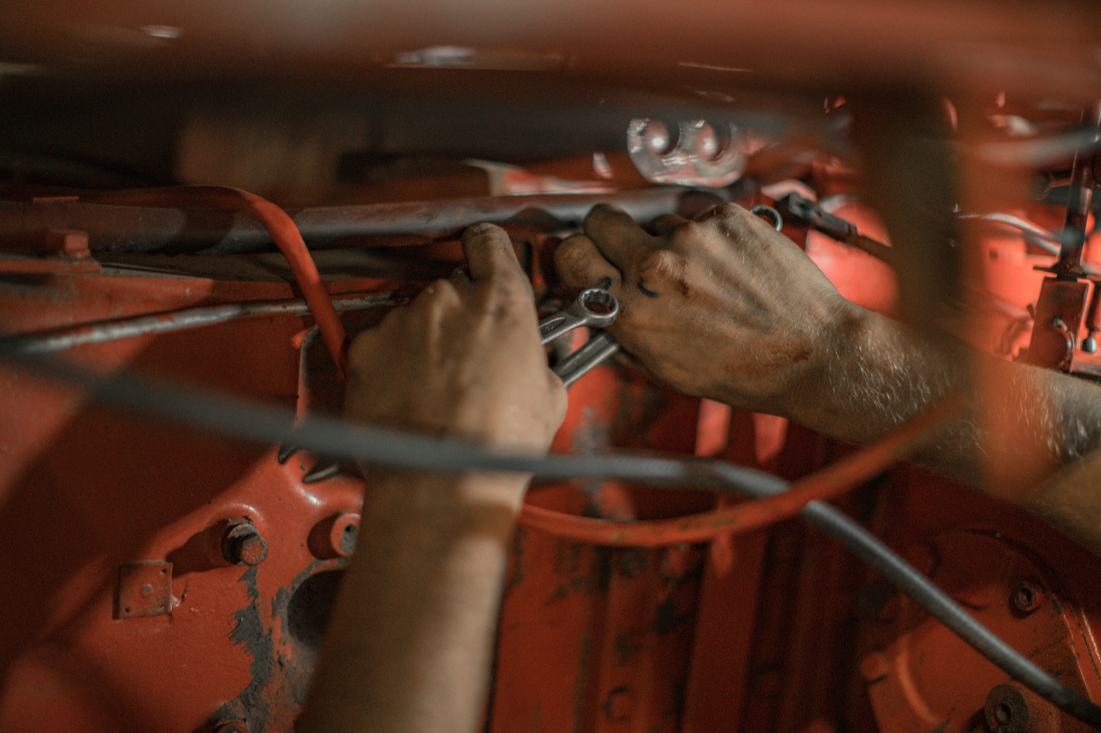 Mechanic working on an automotive engine for Pyra-Sil™ RTV silicone form-in-place gasket FIPG sealing