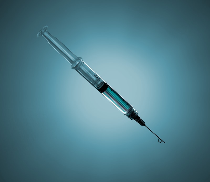 Close-up of syringe tip for Uni-Weld™ UV needle bonding and shallow potting in medical device assembly