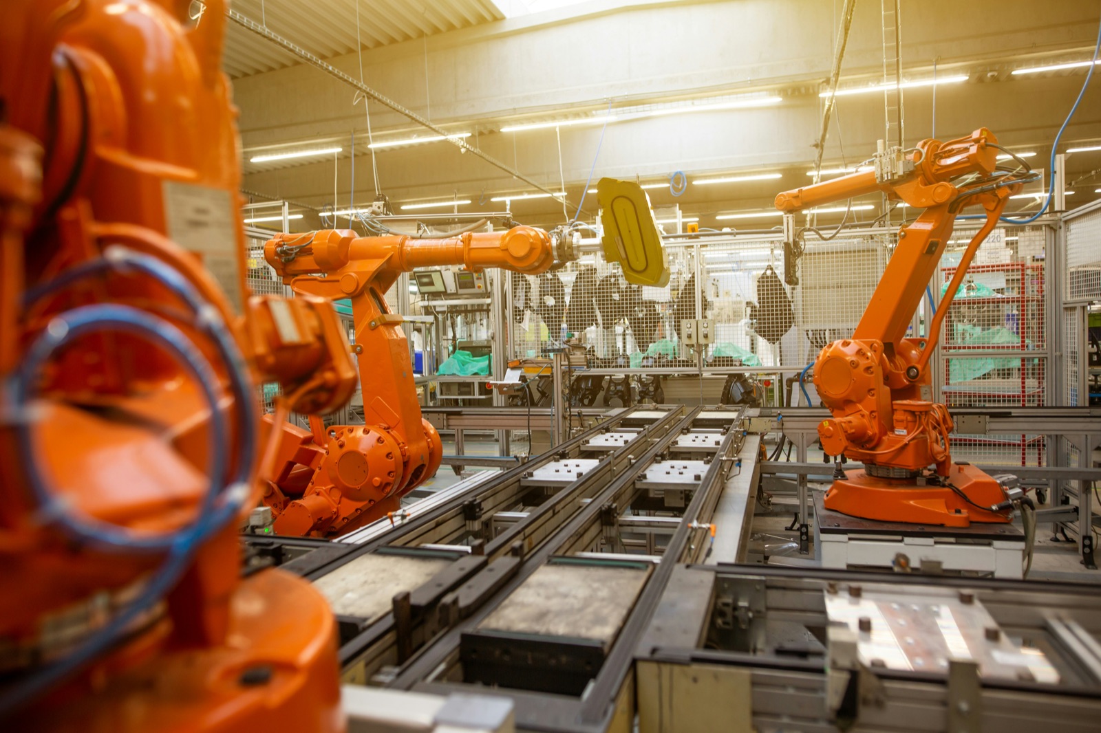 Industrial robot arm automated manufacturing for Incure L9000™ UV LED spot lamp industrial automation