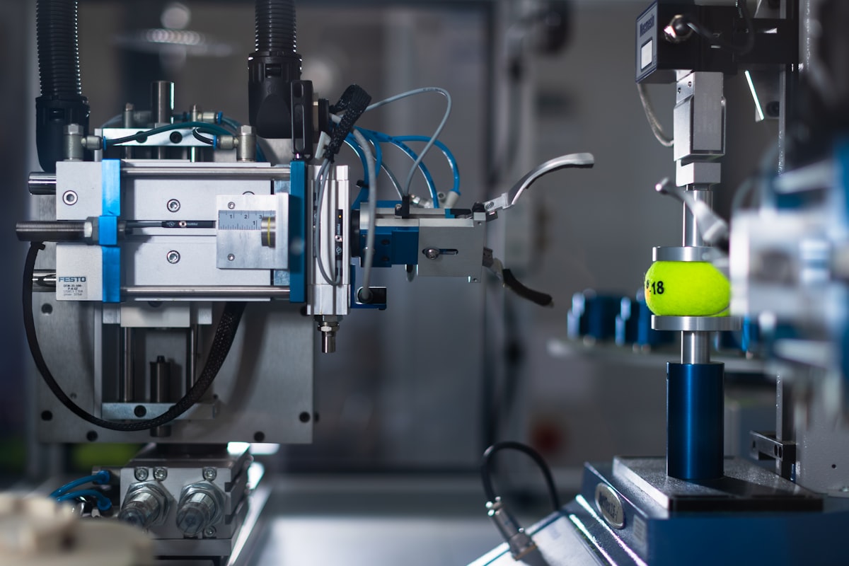 Blue and silver precision industrial dispensing machine for Litemask™ UV maskant dam-and-fill mould cavity masking